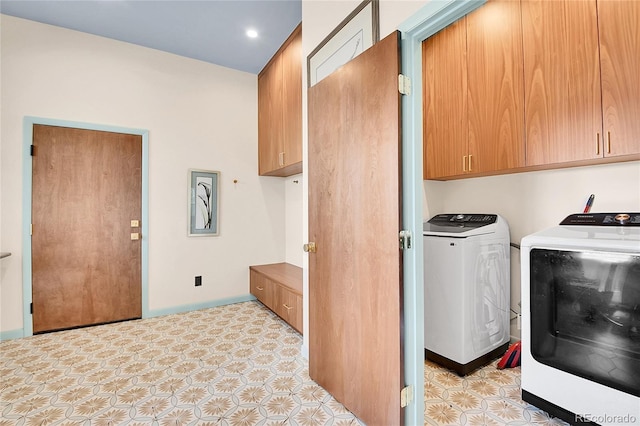 1023 Chippewa Rd, Jefferson, CO 80456 - laundry area featuring washing machine and dryer, cabinet space, and baseboards