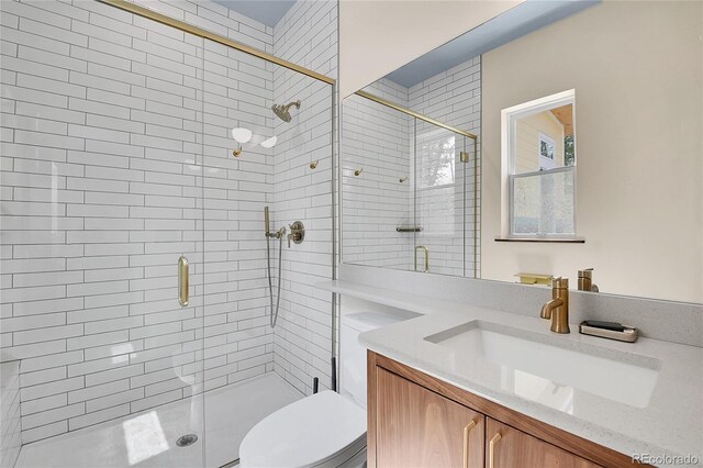 1023 Chippewa Rd, Jefferson, CO 80456 - bathroom with vanity, toilet, and a shower stall