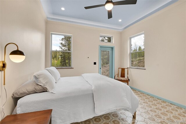 1023 Chippewa Rd, Jefferson, CO 80456 - bedroom featuring multiple windows, recessed lighting, baseboards, and a ceiling fan