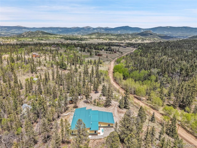 1023 Chippewa Rd, Jefferson, CO 80456 - aerial view of a mountainous background and a heavily wooded area