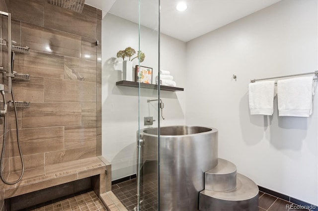 4875 S Monaco St Unit 303, Denver, CO 80237 - full bathroom with a shower stall, baseboards, and recessed lighting