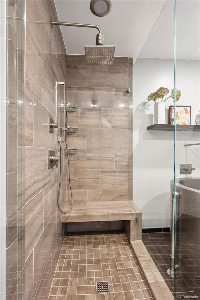 4875 S Monaco St Unit 303, Denver, CO 80237 - bathroom featuring a shower stall