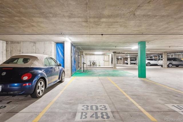4875 S Monaco St Unit 303, Denver, CO 80237 - view of parking garage