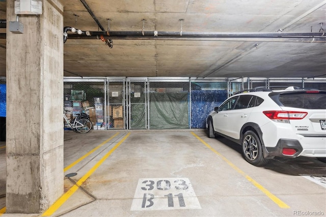 4875 S Monaco St Unit 303, Denver, CO 80237 - view of parking garage