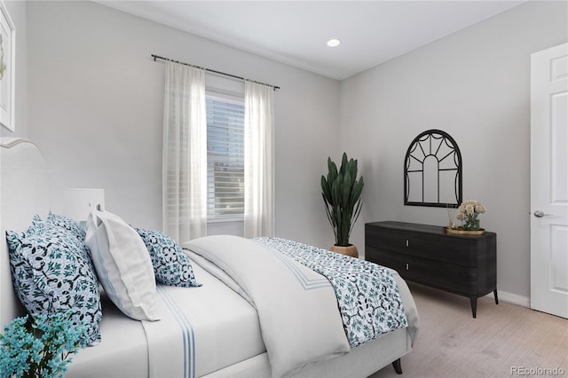 bedroom with recessed lighting and baseboards
