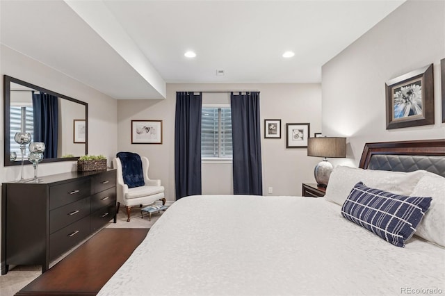 bedroom featuring recessed lighting