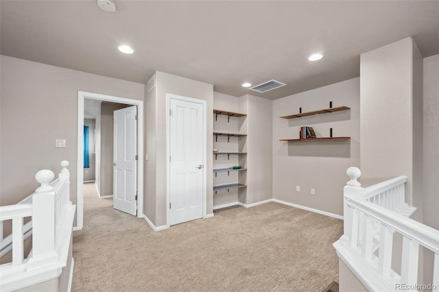 12919 W Burgundy Dr, Littleton, CO 80127 - corridor featuring an upstairs landing, light colored carpet, and recessed lighting