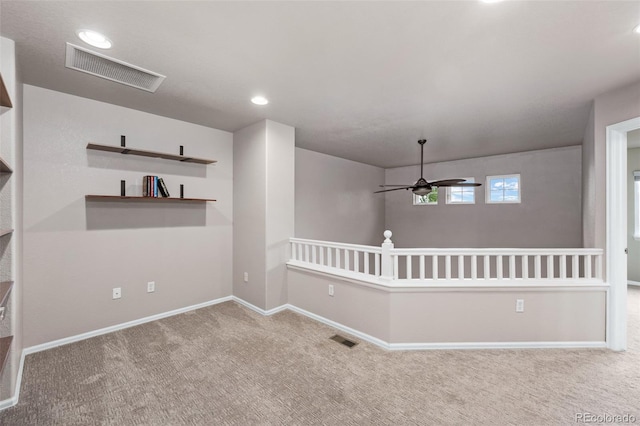 12919 W Burgundy Dr, Littleton, CO 80127 - carpeted spare room with ceiling fan and recessed lighting