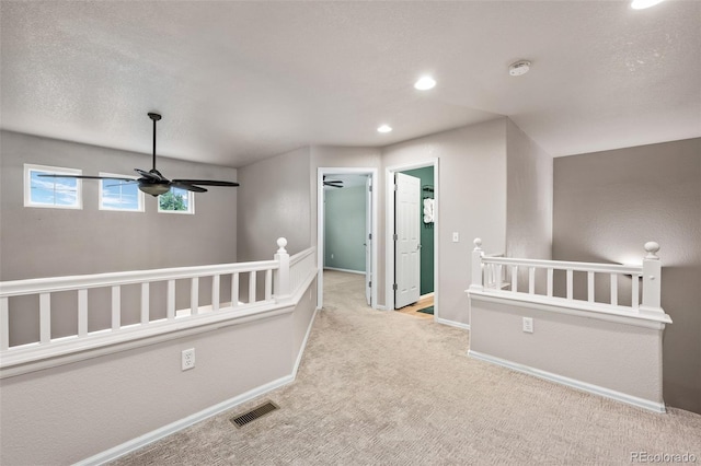 12919 W Burgundy Dr, Littleton, CO 80127 - hallway with an upstairs landing, carpet, and recessed lighting