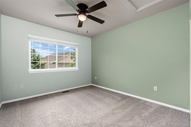12919 W Burgundy Dr, Littleton, CO 80127 - carpeted empty room featuring a ceiling fan and attic access