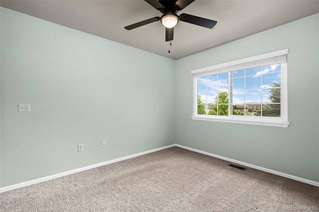 12919 W Burgundy Dr, Littleton, CO 80127 - carpeted empty room with baseboards and ceiling fan