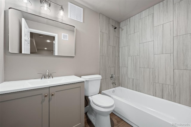 12919 W Burgundy Dr, Littleton, CO 80127 - full bathroom with vanity, shower / bath combination, and wood finished floors