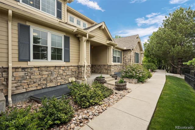 12919 W Burgundy Dr, Littleton, CO 80127 - doorway to property with stone siding