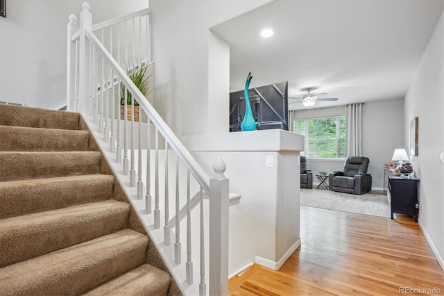 1441 S Ulster St, Denver, CO 80231 - stairway with wood finished floors, ceiling fan, baseboards, and recessed lighting