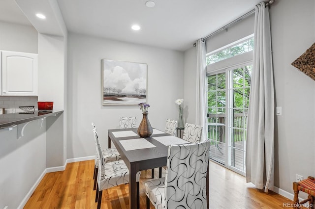 1441 S Ulster St, Denver, CO 80231 - dining space with light wood-style floors, baseboards, and recessed lighting