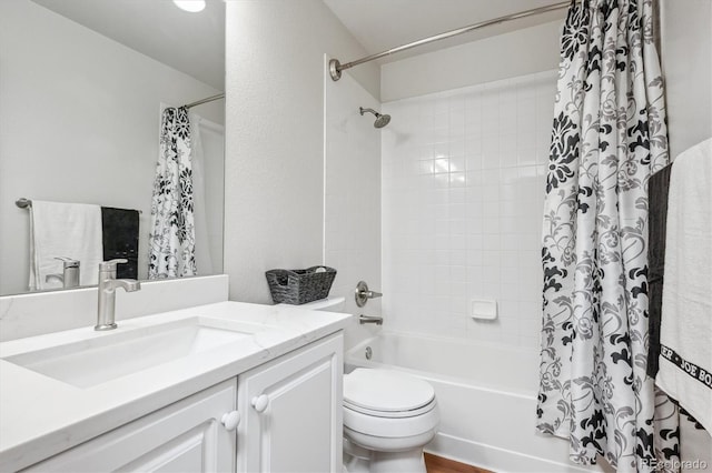 1441 S Ulster St, Denver, CO 80231 - full bathroom featuring shower / tub combo, vanity, and toilet