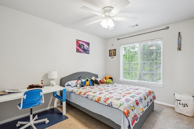 1441 S Ulster St, Denver, CO 80231 - carpeted bedroom with baseboards, a ceiling fan, and an office area