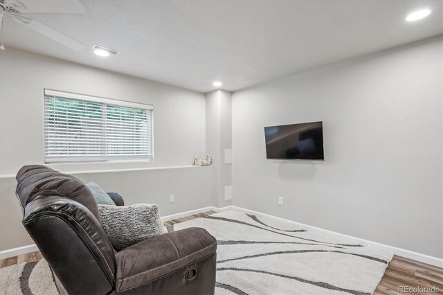 1441 S Ulster St, Denver, CO 80231 - living room featuring wood finished floors, baseboards, recessed lighting, and ceiling fan