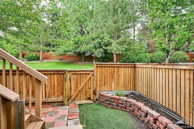 1441 S Ulster St, Denver, CO 80231 - view of yard with a gate