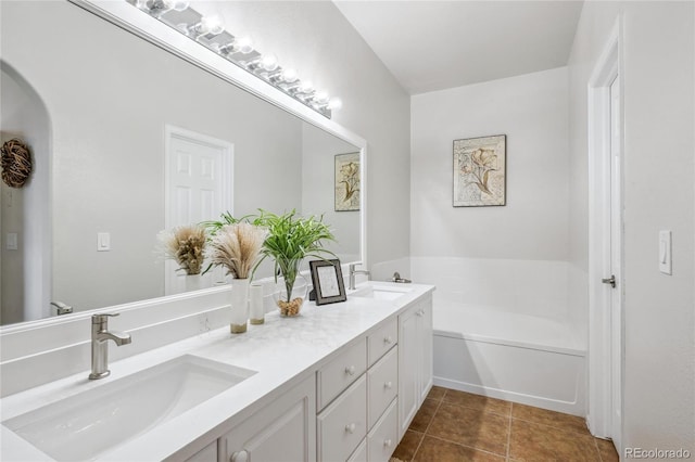 1441 S Ulster St, Denver, CO 80231 - full bathroom with double vanity, a bath, and tile patterned floors