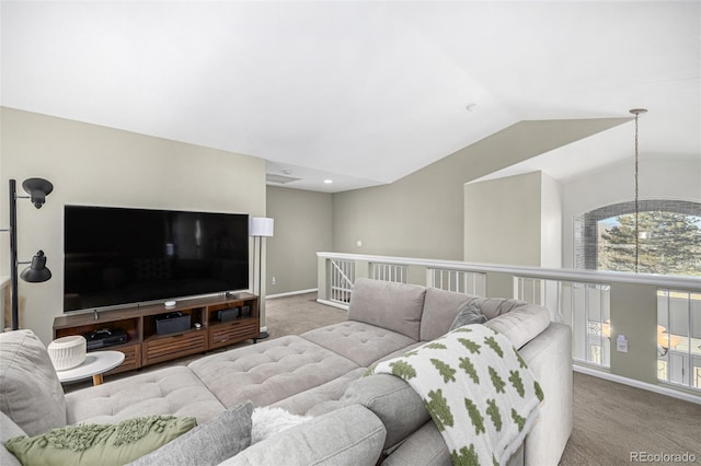 living room featuring carpet and lofted ceiling