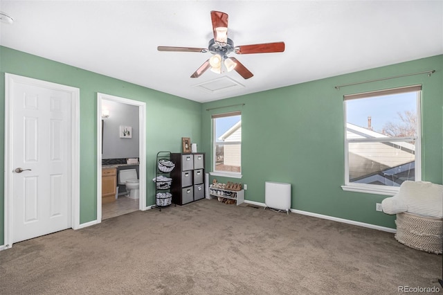 unfurnished bedroom featuring connected bathroom, ceiling fan, and carpet floors