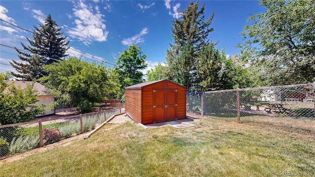 6836 W 79th Dr, Arvada, CO 80003 - fenced backyard featuring a storage unit