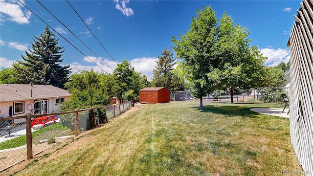 6836 W 79th Dr, Arvada, CO 80003 - fenced backyard featuring a storage shed