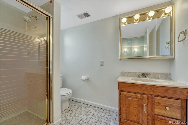 full bathroom featuring visible vents, toilet, a stall shower, baseboards, and vanity