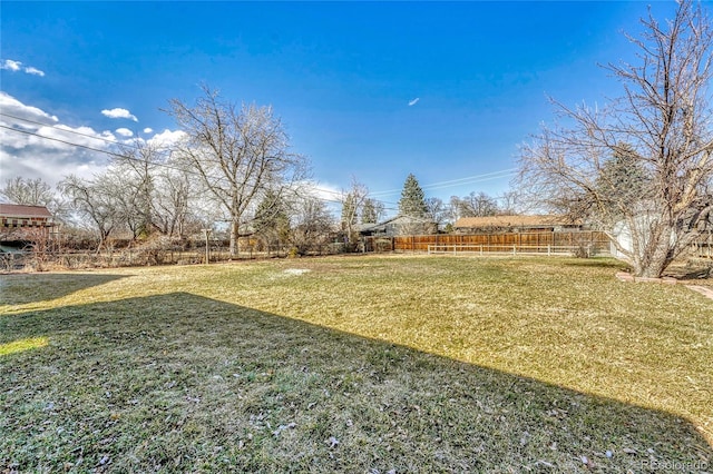 view of yard with fence