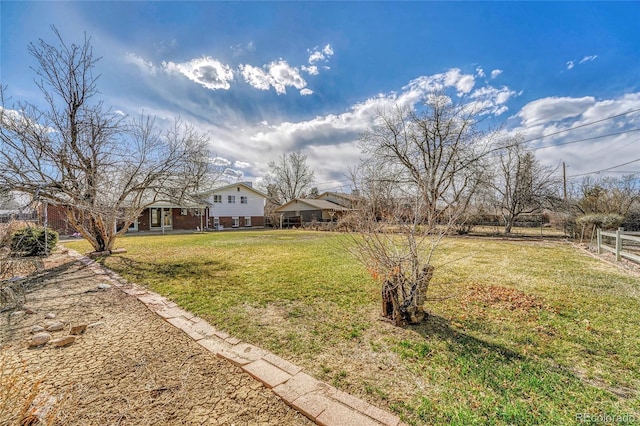 view of yard with fence