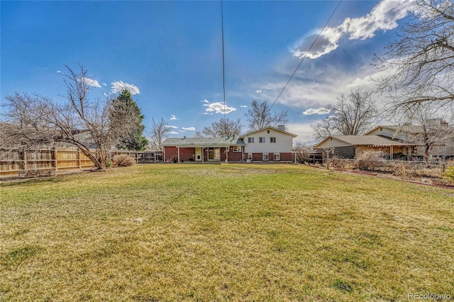 view of yard with fence