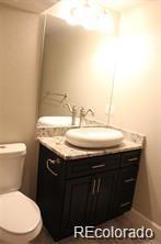 15305 W 93rd Ave, Arvada, CO 80007 - half bath with vanity and toilet