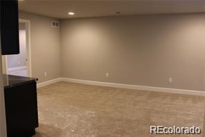 15305 W 93rd Ave, Arvada, CO 80007 - carpeted empty room featuring baseboards and recessed lighting
