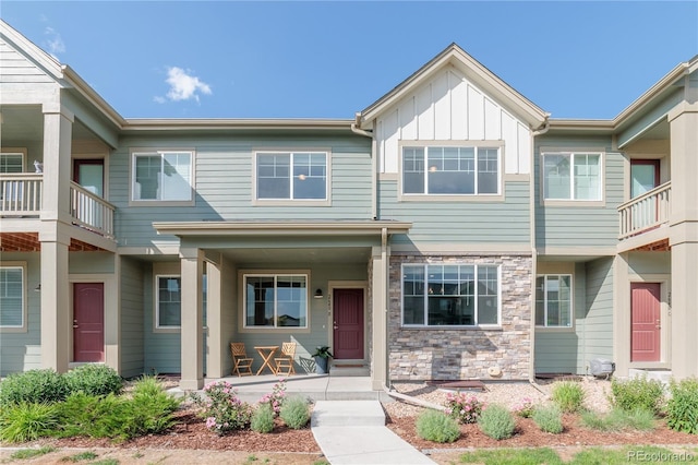 2640 Brookstone Dr Unit B, Milliken, CO 80543 - multi unit property featuring covered porch, board and batten siding, and stone siding