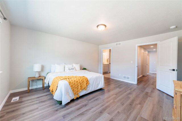 2640 Brookstone Dr Unit B, Milliken, CO 80543 - bedroom with light wood finished floors