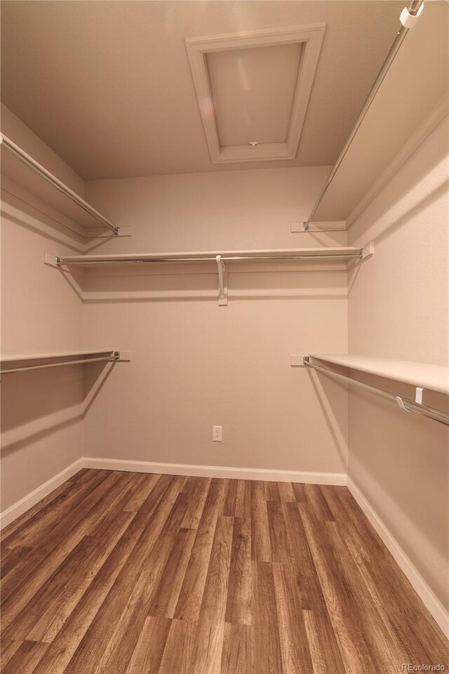 2640 Brookstone Dr Unit B, Milliken, CO 80543 - walk in closet featuring wood finished floors