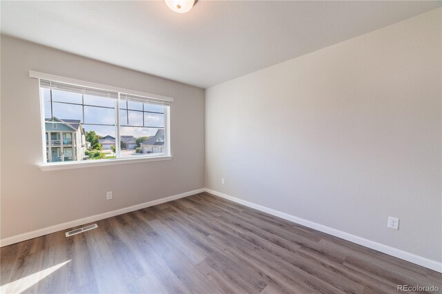 2640 Brookstone Dr Unit B, Milliken, CO 80543 - unfurnished room with wood finished floors