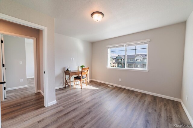 2640 Brookstone Dr Unit B, Milliken, CO 80543 - dining area with wood finished floors