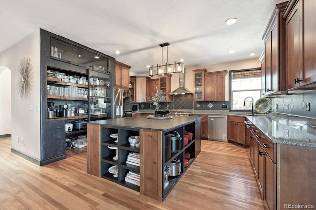 6985 Fallon Cir, Castle Rock, CO 80104 - kitchen with open shelves, dishwasher, wall chimney exhaust hood, light wood-style flooring, and recessed lighting