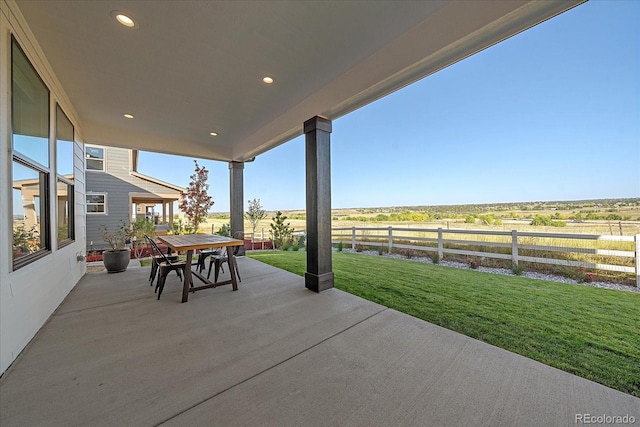 view of patio with a rural view