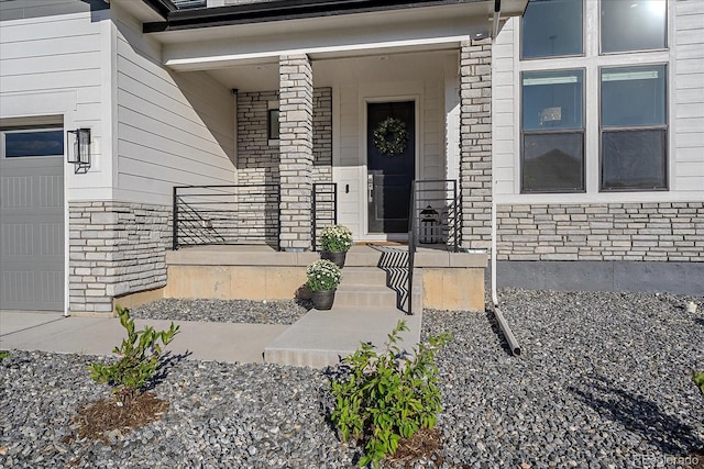 entrance to property featuring a garage