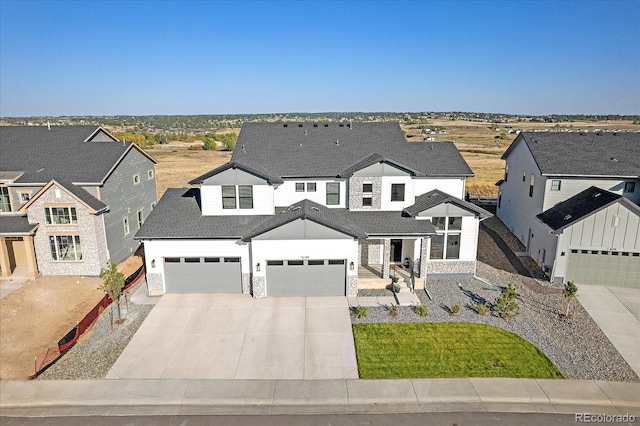 modern farmhouse featuring a garage