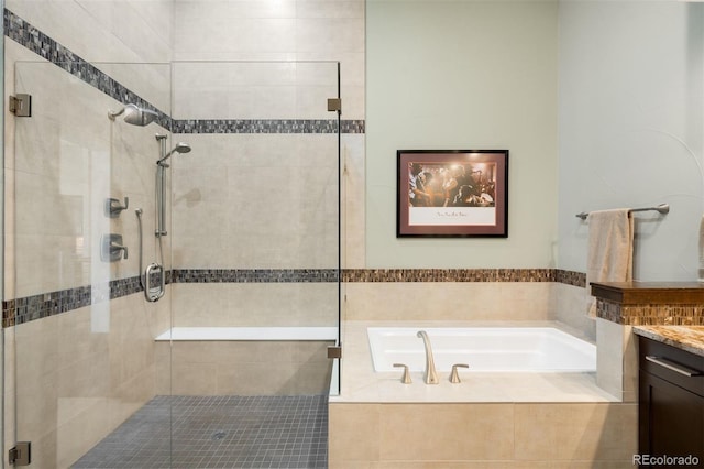 10243 Spring Green Dr, Englewood, CO 80112 - full bathroom with vanity, a bath, and a shower stall