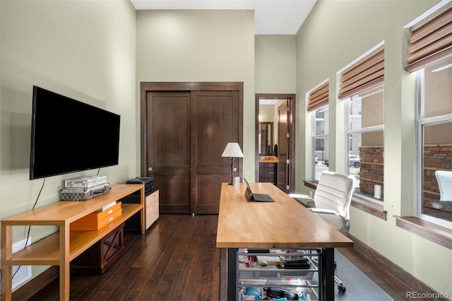 10243 Spring Green Dr, Englewood, CO 80112 - office area featuring dark wood-style flooring and a high ceiling