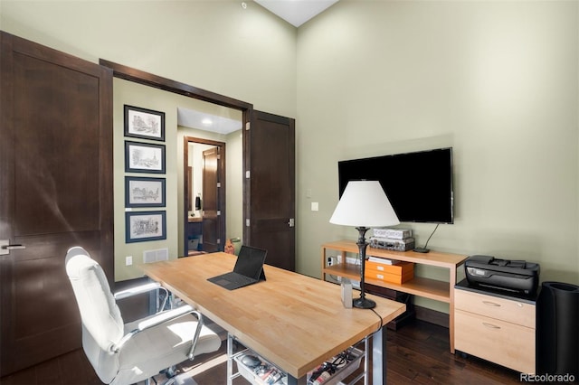 10243 Spring Green Dr, Englewood, CO 80112 - home office featuring dark wood-style flooring