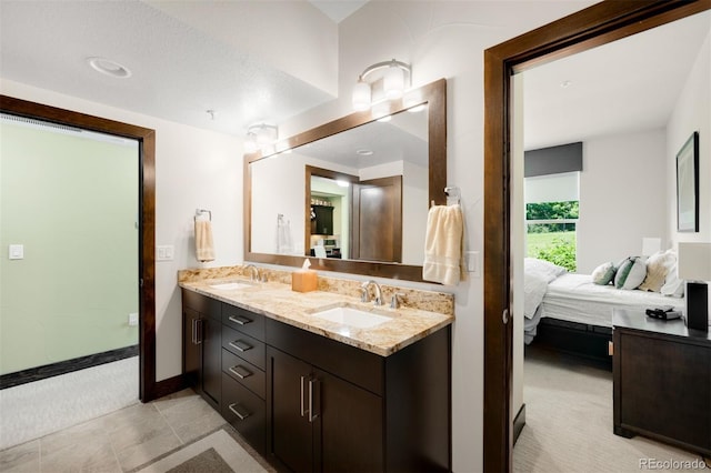 10243 Spring Green Dr, Englewood, CO 80112 - bathroom with ensuite bath and double vanity