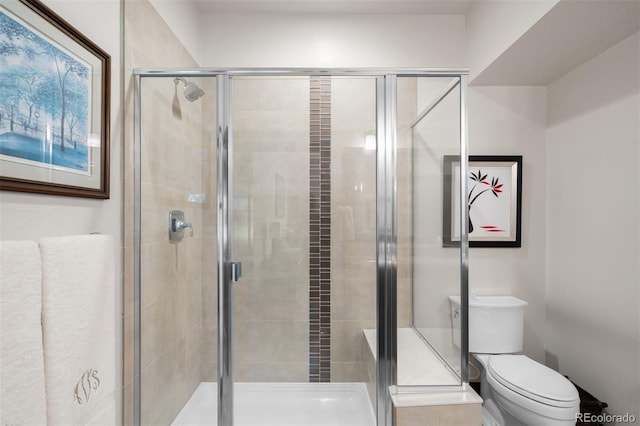10243 Spring Green Dr, Englewood, CO 80112 - full bathroom featuring toilet and a stall shower