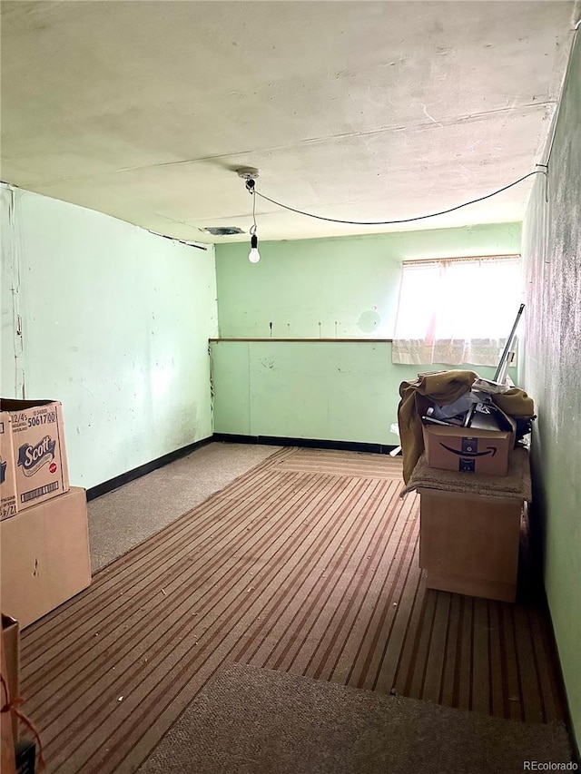647 D St, Salida, CO 81201 - empty room featuring carpet and baseboards