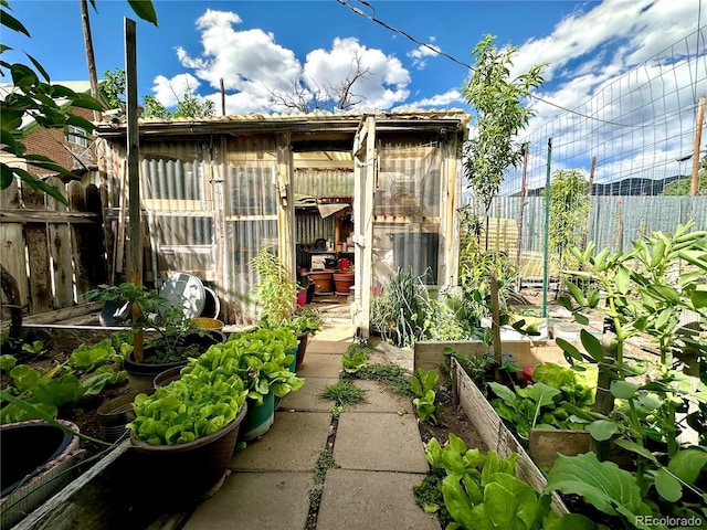 647 D St, Salida, CO 81201 - view of greenhouse featuring a garden